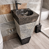 Lavabo con colonna in pietra naturale e marmo nero