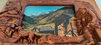 Cornice in legno intagliato stile alpino