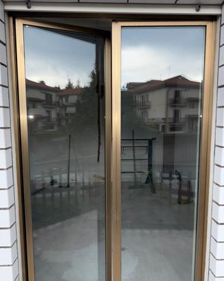 Infissi alluminio oro