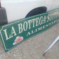 Insegna a pannello per negozio anni 2000 