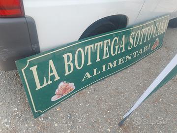 Insegna a pannello per negozio anni 2000 