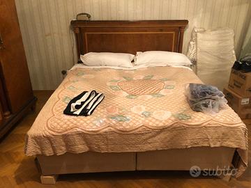 Letto matrimoniale e armadio camera letto