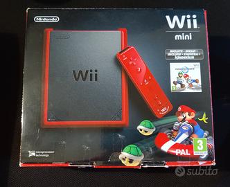 Console Nintendo mini wii e scatola e giochi
