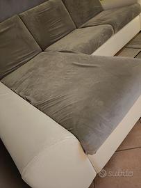 divano con penisola contenitore in pelle