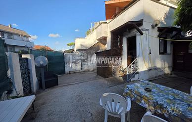 Bilocale con giardino