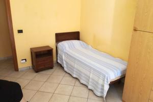 Posto letto in stanza singola con balcone
