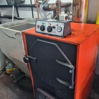 Caldaia a pellets per abitazione e puffer da 1000