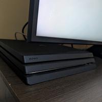 PS4 pro + 4 giochi e accessori + joystick