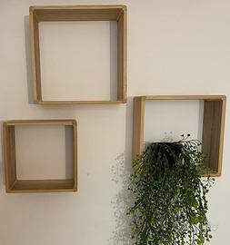 Quadrati in legno a parete