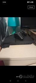 PlayStation 2 + 5 giochi 