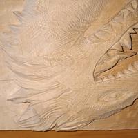 testa di drago su legno 