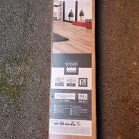 Listoni in laminato legno  e tappetino isolante