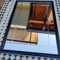 Specchio cameretta cornice nera.