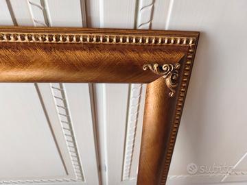 cornice in legno foglia oro 