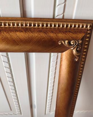 cornice in legno foglia oro 