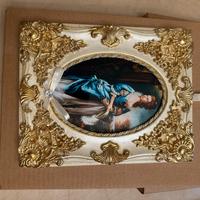 Quadro con cornice barocca dorata