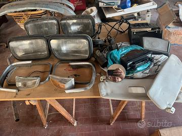 Ricambi epoca Audi 60L fari Hella e accessori