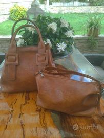 Due borse P R A D A in pelle