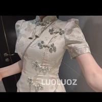 Qipao cinese ricamato a mano