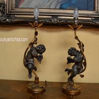 Antica coppia di lampade da tavolo con cherubini