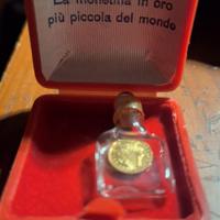 "la moneta più piccola del mondo in oro"
