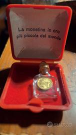 "la moneta più piccola del mondo in oro"