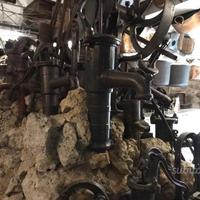 Pompe in ghisa paioli rame e pietra molto antiche
