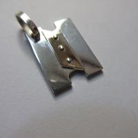 Iniziale N in argento e oro