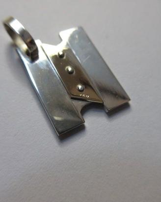 Iniziale N in argento e oro