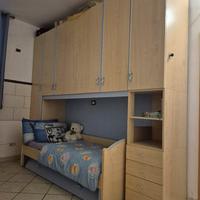 armadio a ponte con letto