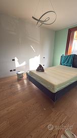 Letto 130x200 testiera imbottita in velluto,