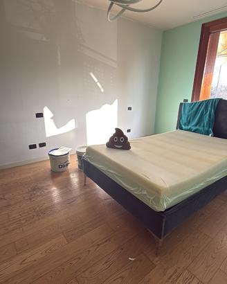 Letto 130x200 testiera imbottita in velluto,