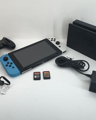 Nintendo Switch V1 + Dock  + 2 Giochi + Pokeball