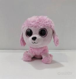 Peluche a forma di cane di colore rosa con grandi