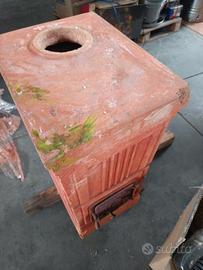 stufa a legna in cotto .