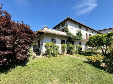 PORZIONE DI BIFAMILIARE A CALCO