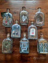 Set Holmegaard 8 bottiglie liquore natalizie 
