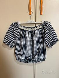 Maglietta a quadri neri e bianchi con margherite