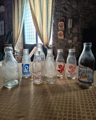Raccolta bottiglie latte vintage