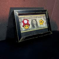 1 dollaro in cornice