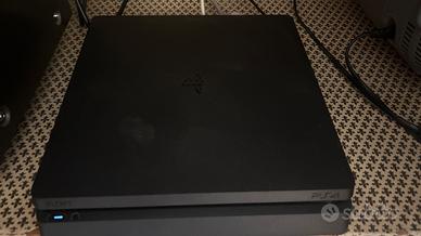 Ps4 + 4 giochi + 2 controller
