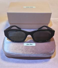 Occhiali da sole MIU MIU SMU A03