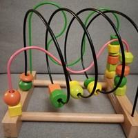 Gioco in legno labirinto con perline