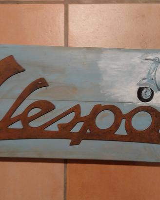 scritta vespa vintage in acciaio