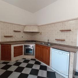 Piano cucina in granito rosa angolare 2,88+2,04