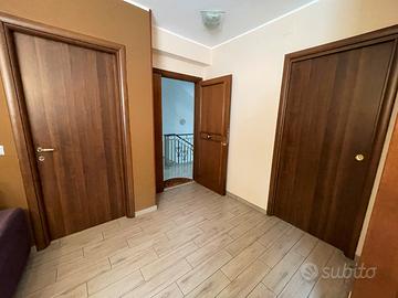 Appartamento con box e giardino