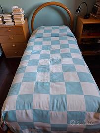 due letti singoli con materassi