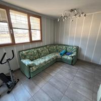 Divano angolare in tessuto verde (come nuovo)