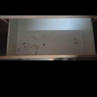 Cassettiera e fasciatoio con cassetti