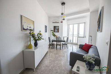 E. Amari-Porto: bilocale arredato